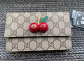 Pre‑owned Gucci GG Supreme Cherry Long Flap Wallet
