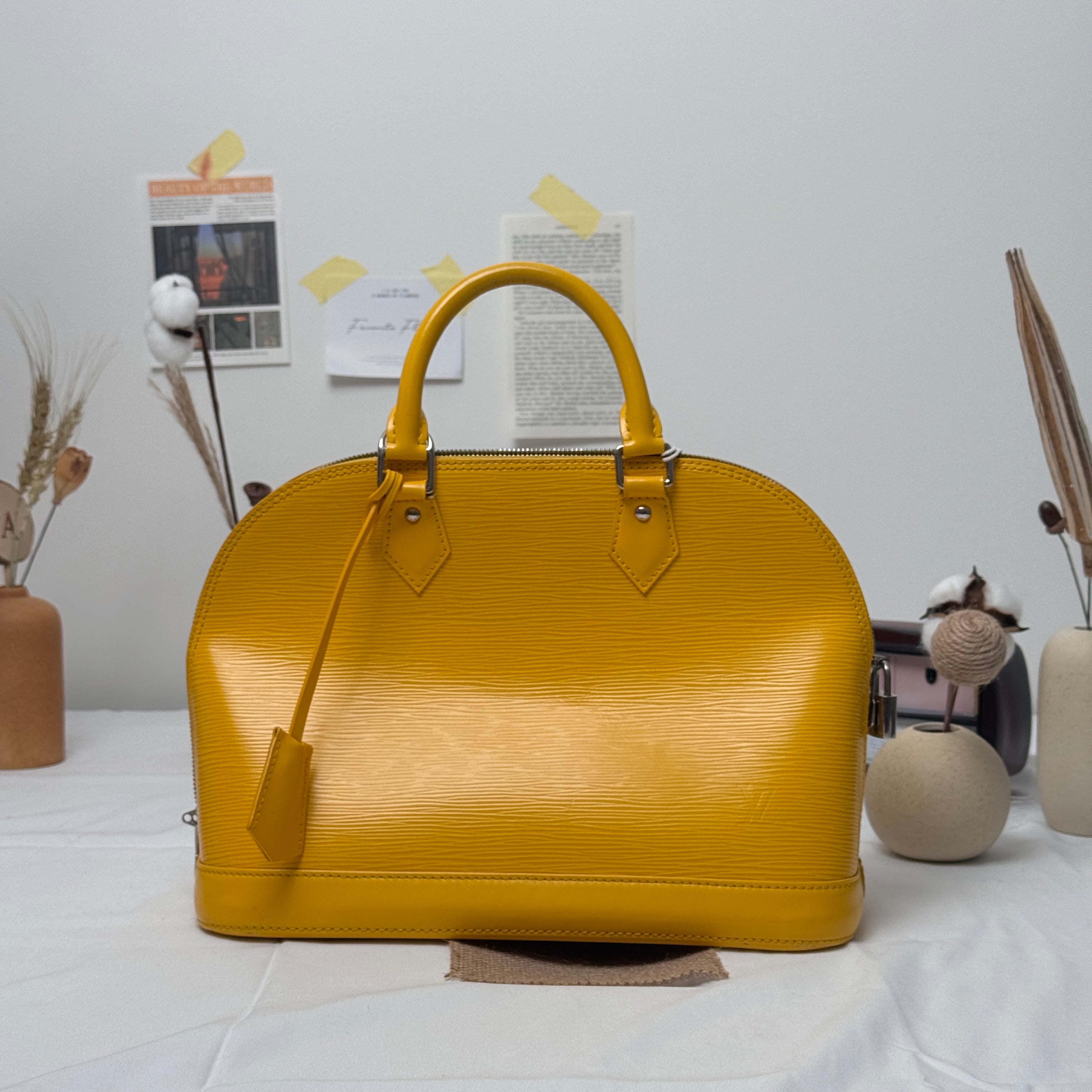 Pre‑owned Louis Vuitton Alma PM Yellow Epi Leather Handbag