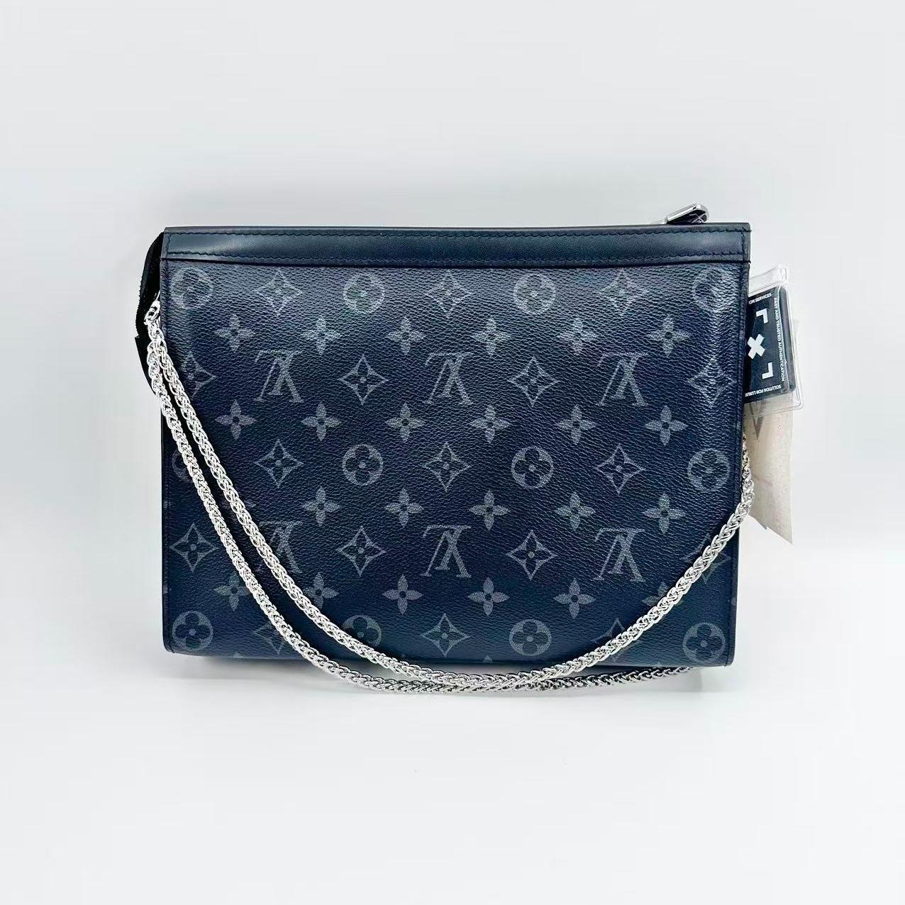 Louis Vuitton canvas Clutches & Wristlets Pochette Voyage MM Monogram Eclipse Clutch Bag