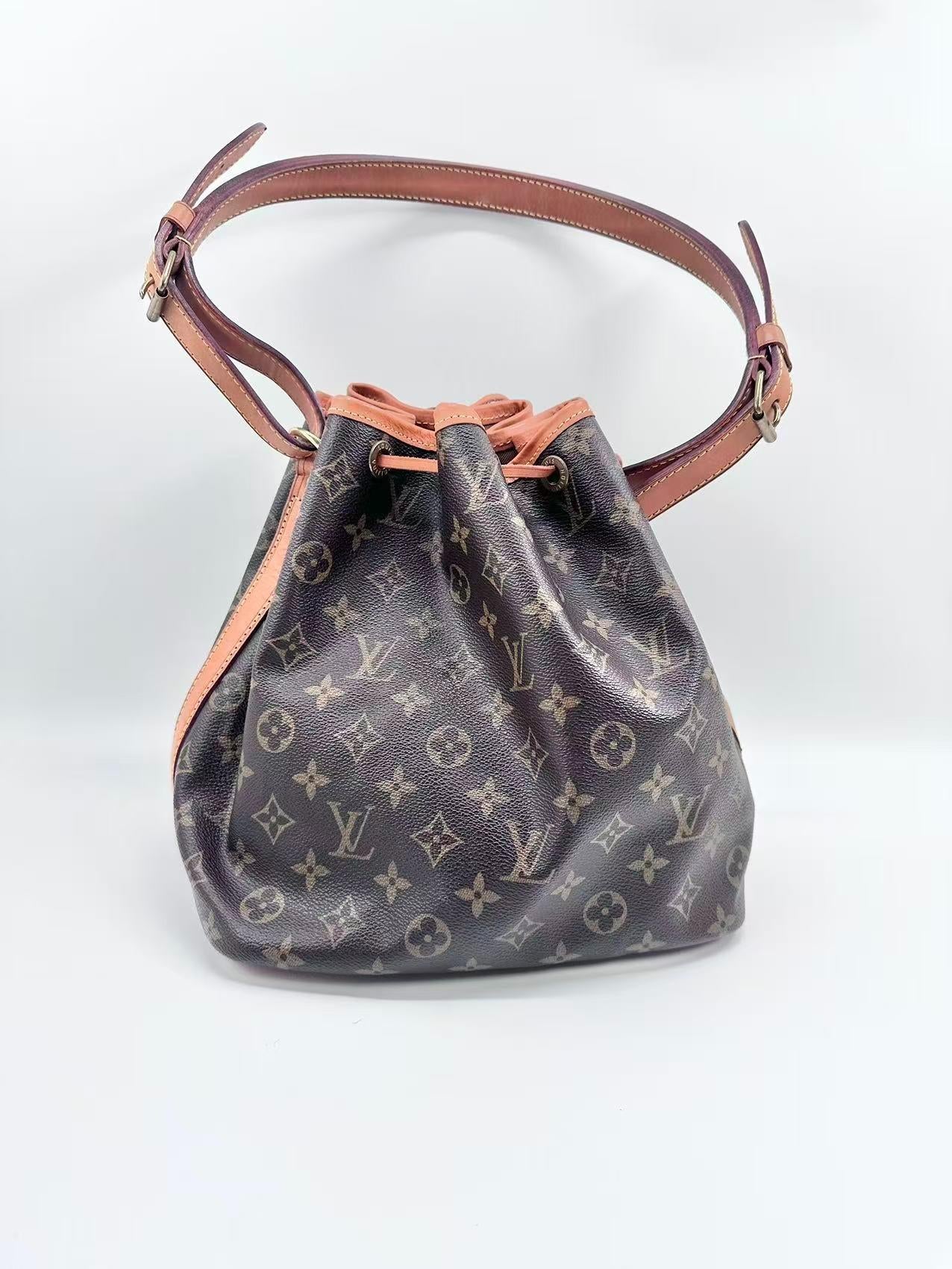 Louis Vuitton pvc Shoulder Bags Monogram Canvas Bucket Bag with Brown Leather Trim and Drawstring Closure